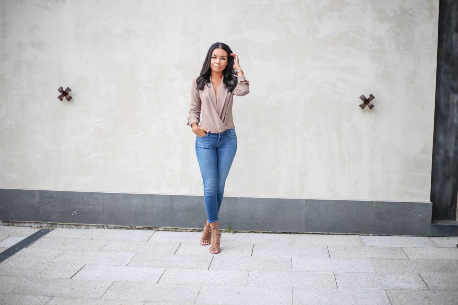 Mother crop denim with a twist front blouse and lace up nude heels