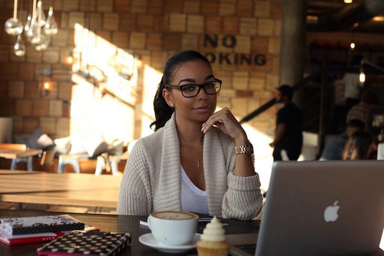 Woman with glasses at cafe