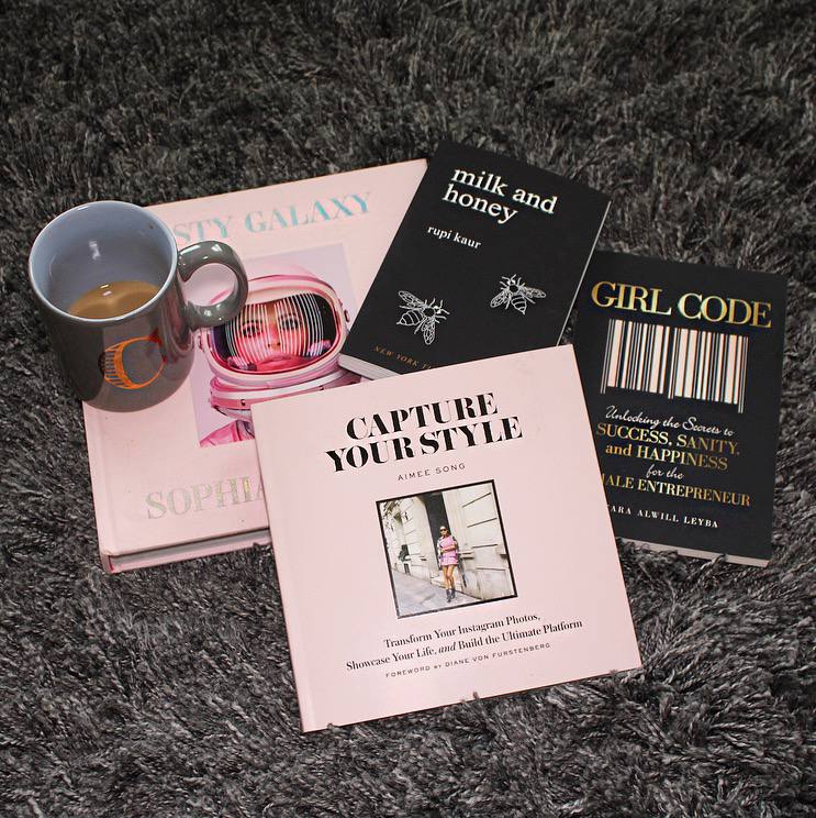 Books and coffee on carpet