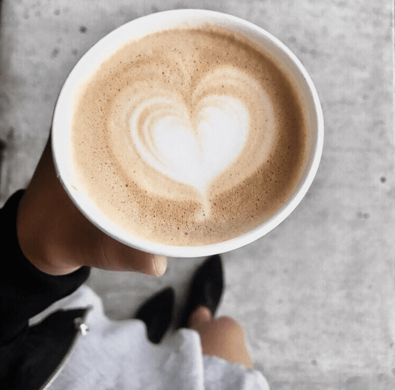 Latte art heart in coffee