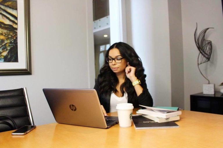 Woman working on laptop in office