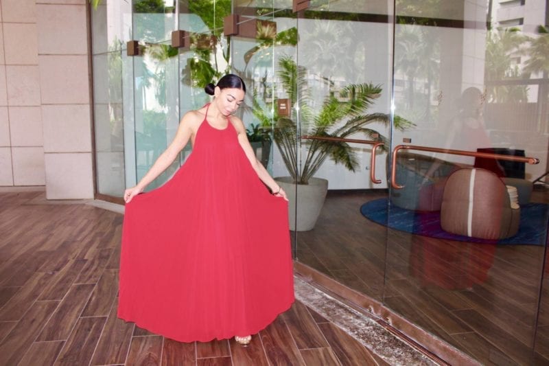 Woman in flowing red dress.