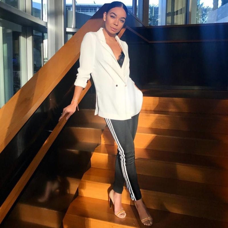 Woman posing on wooden stairs