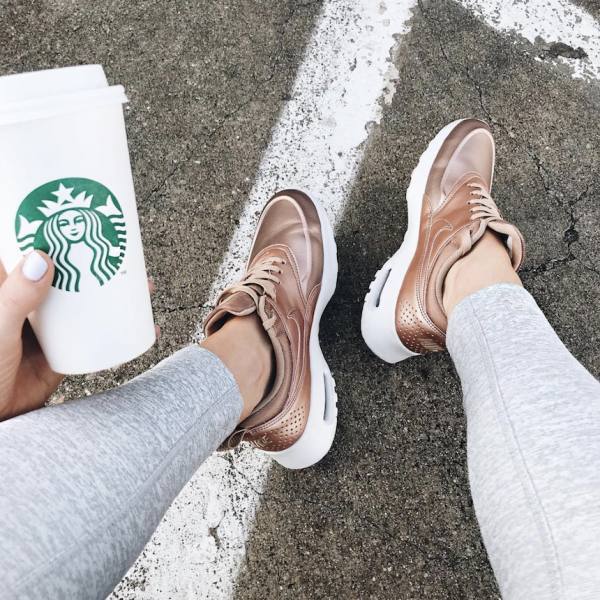 Rose gold sneakers and coffee
