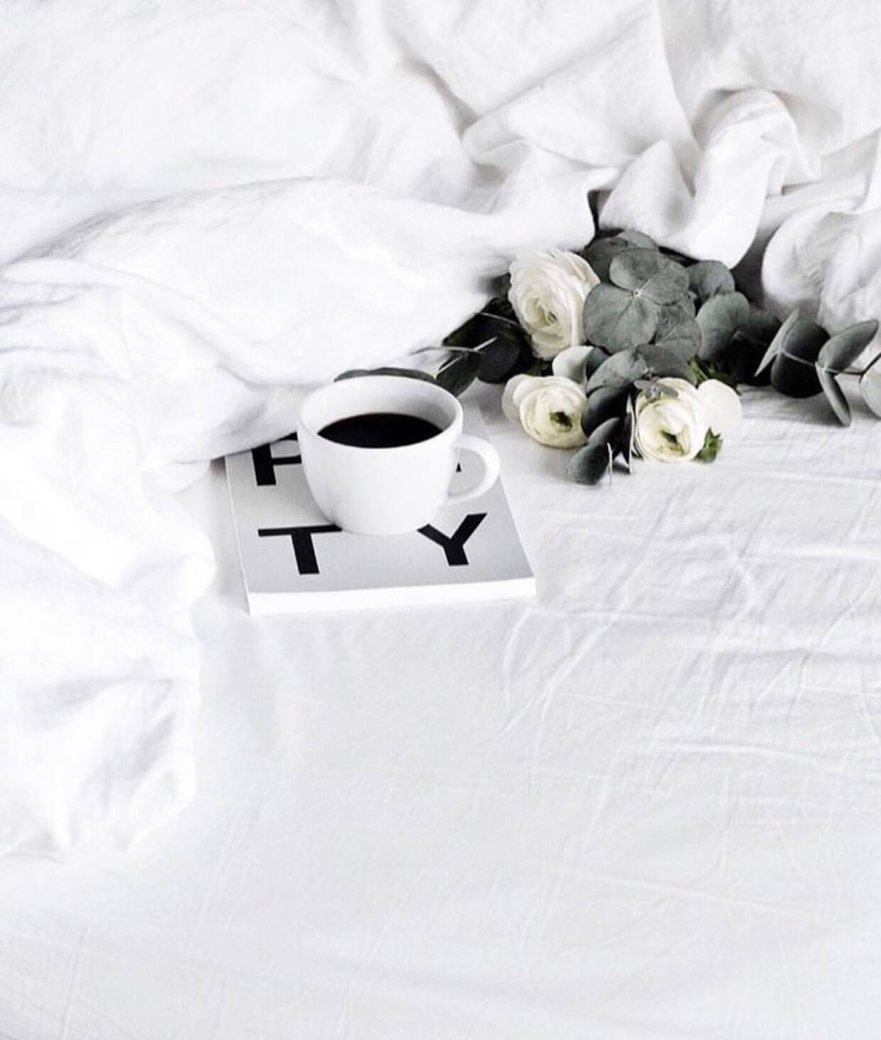 Coffee, book, and flowers