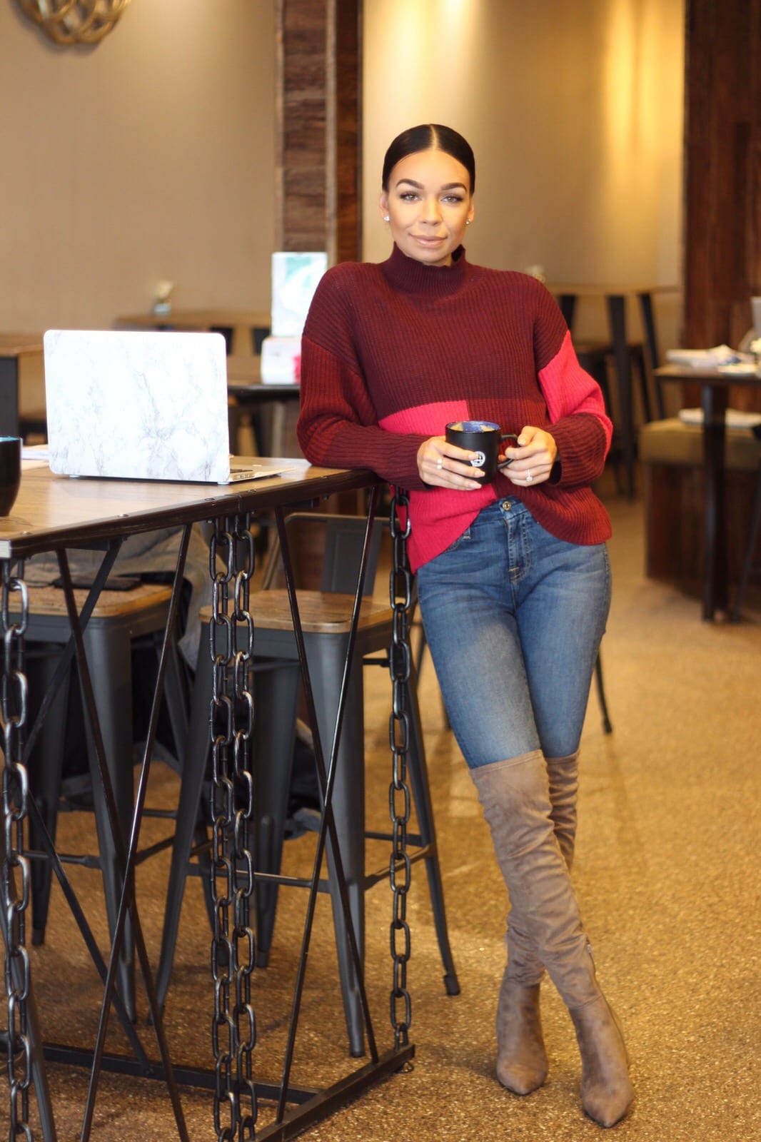 Woman with coffee and laptop