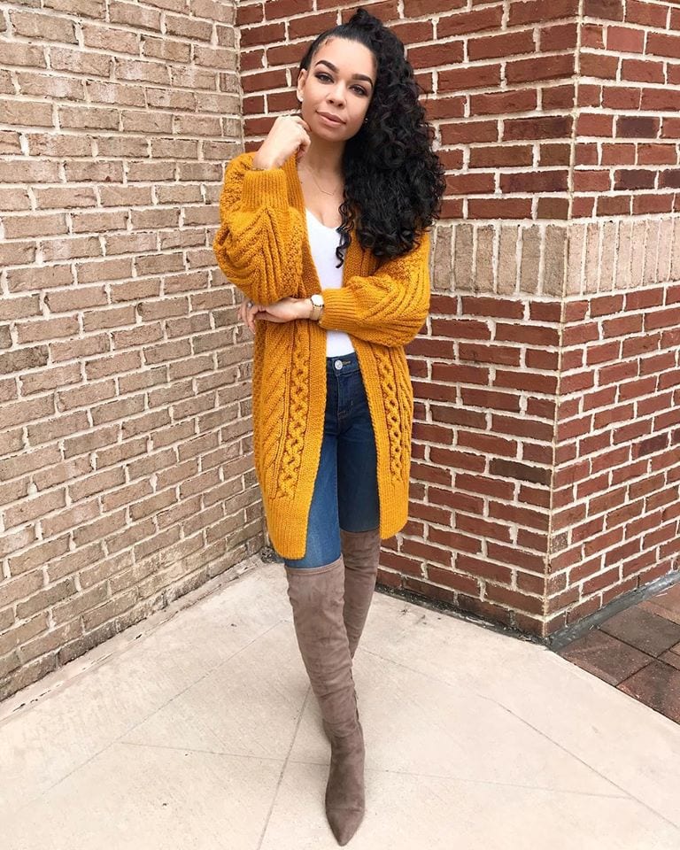 Woman in mustard cardigan