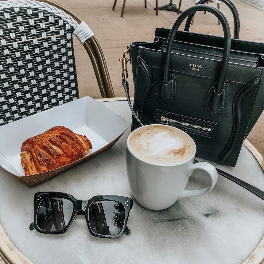 Coffee, pastry, and sunglasses at cafe