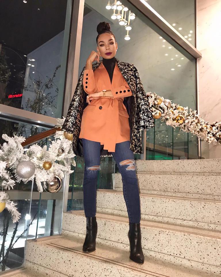 Woman posing on stairs