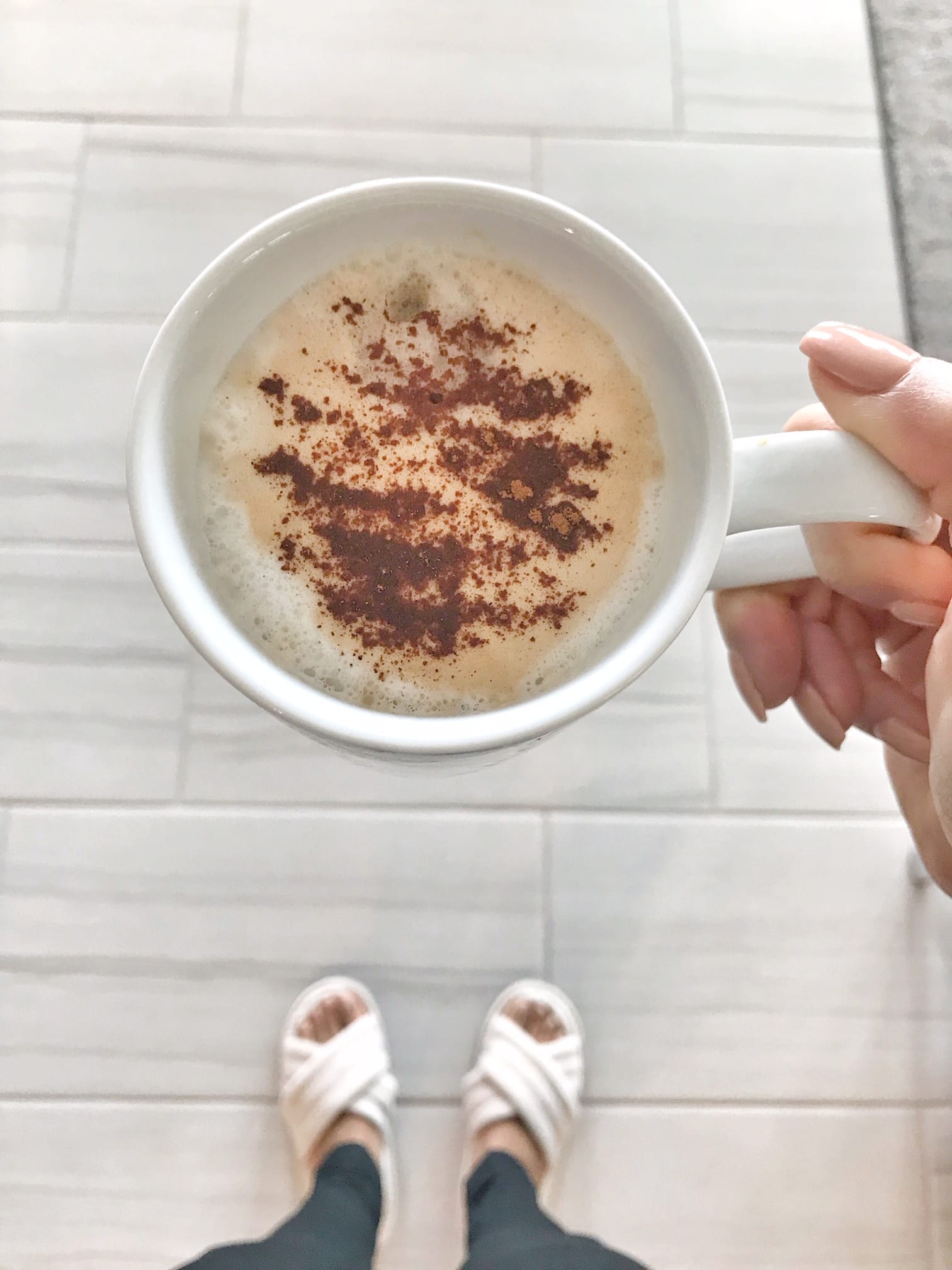 Cup of coffee with cinnamon
