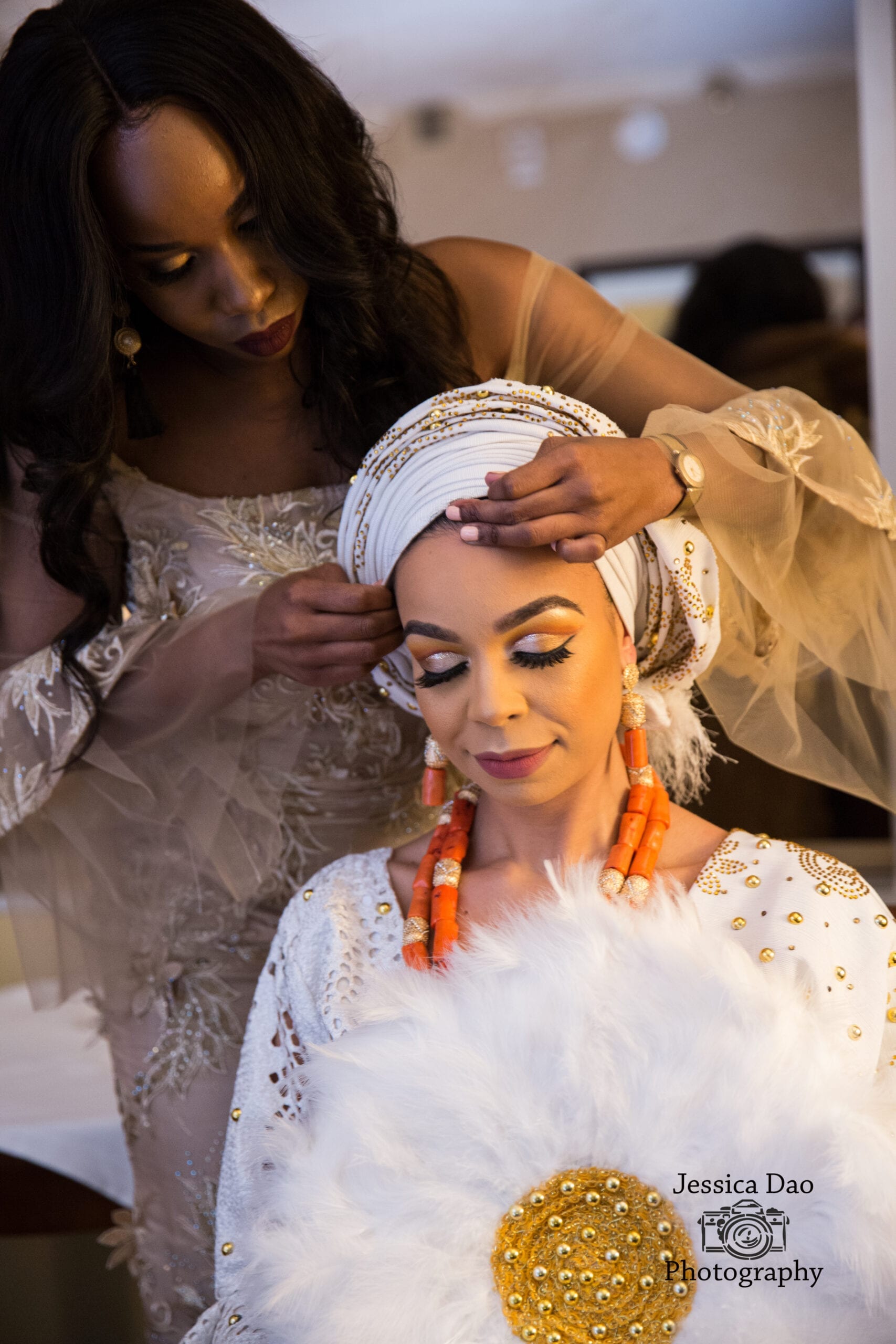 Bridal preparation with ornate jewelry.